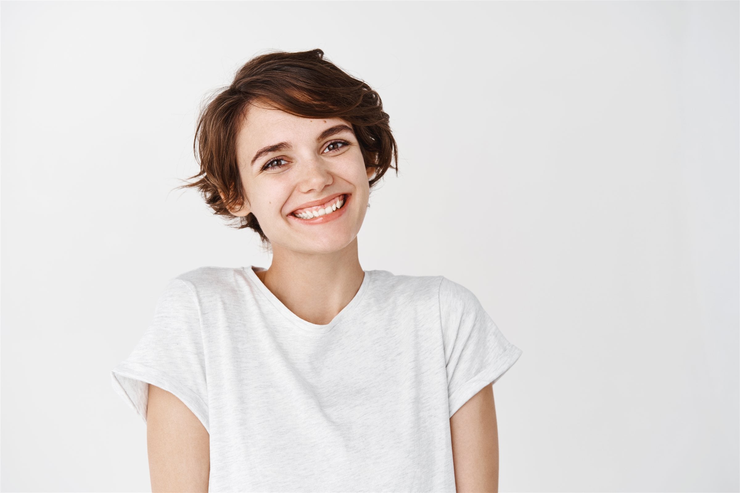 Smiling woman in a white T-shirt